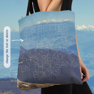 Snow-capped mountain peaks tote bag