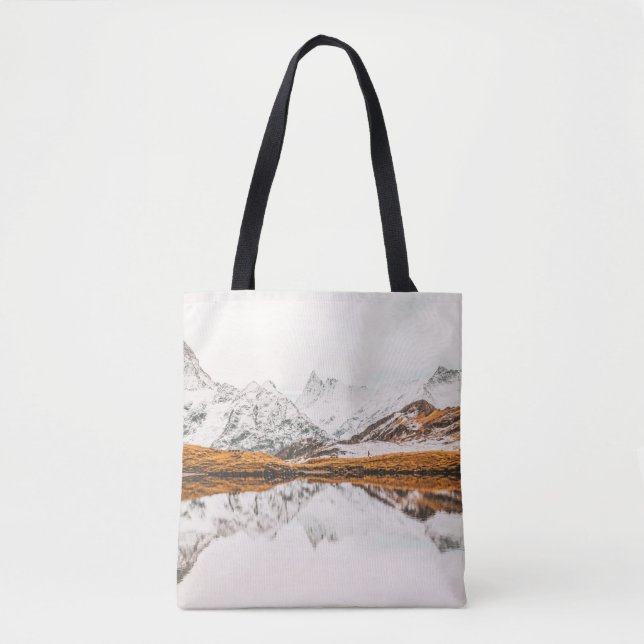 SNOW-CAPPED ROCKY MOUNTAIN UNDER CLOUDY SKY DURING TOTE BAG (Front)