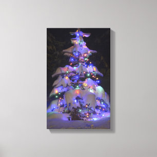 Snow Covered Brightly Lit Christmas Tree Canvas Print