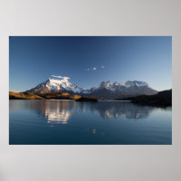 SNOW COVERED MOUNTAIN IN REFLECTIVE PHOTOGRAPHY
