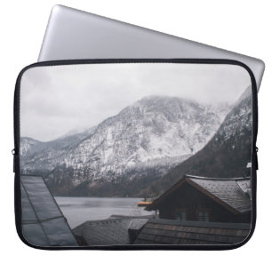 SNOW-COVERED MOUNTAIN NEAR BODY OF WATER LAPTOP SLEEVE