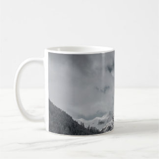 SNOW COVERED MOUNTAIN UNDER CLOUDY SKY DURING DAYT COFFEE MUG