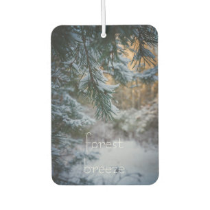 Snow-covered pine branches car air freshener