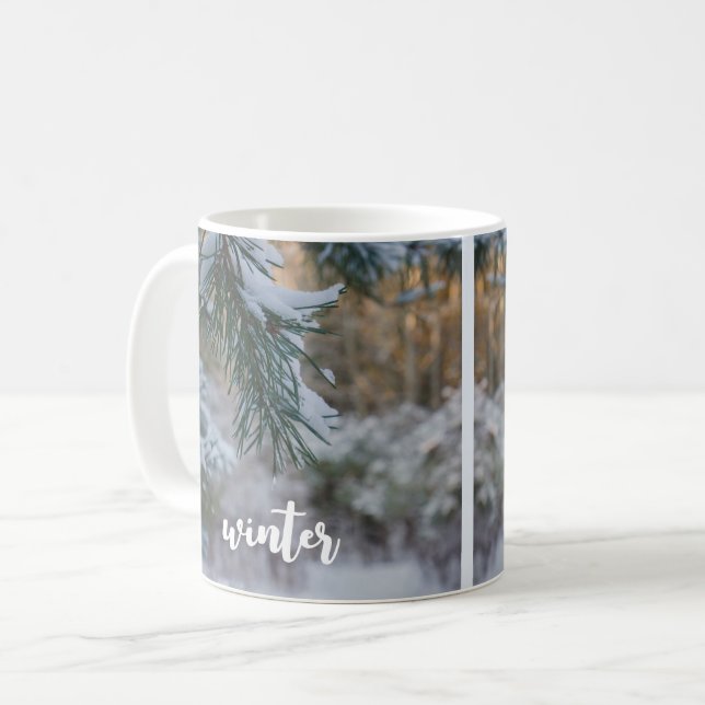 Snow-covered pine branches coffee mug (Front Left)