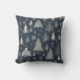 snow-covered trees and snowflakes cushion