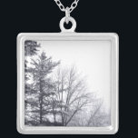 Snow-covered Trees: Horizontal Silver Plated Necklace<br><div class="desc">In the horizontal black and white photo of snow-covered trees,  two evergreens on the left edge of the frame overlook several shorter barren deciduous trees,  all covered with snow. The sky above them is white. 


 Digital,  black & white photograph. 
 Copyright © 2011 Claire E. Skinner. All rights reserved.</div>