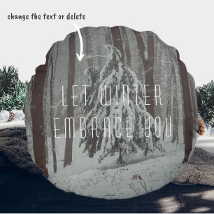 Snow-covered trees in the misty winter forest round cushion