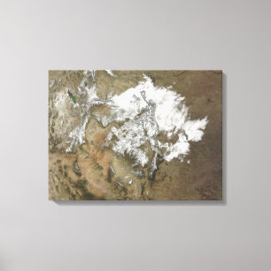 Snow covers the Rocky Mountains in United State Canvas Print