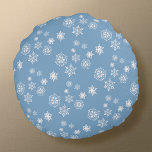 Snow Day Round Cushion<br><div class="desc">This fluffy round throw pillow has two looks--little white snowflakes on a foggy-day blue background on one side,  and a scattering of bigger flakes on a deep evening blue background on the other.  Perfect for snuggling up by a cosy fireplace day or night.</div>