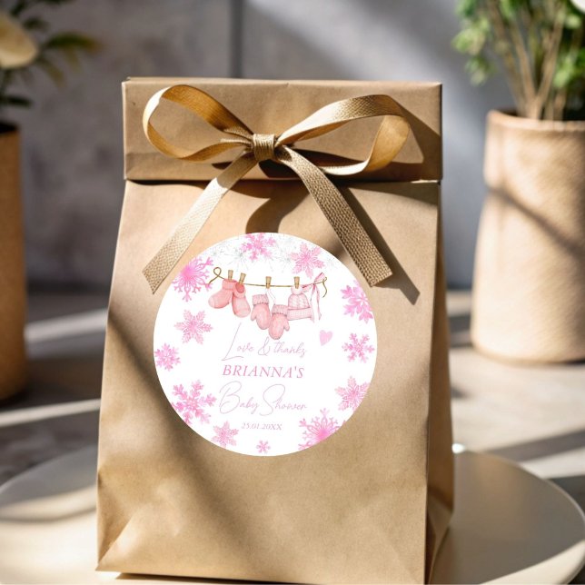 Snow in love snowflakes baby shower favour classic round sticker (Snow in love snowflakes pink clothes on a line winter baby shower thank you favor sticker)