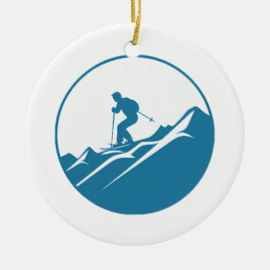 Snow Skier Skiing Down Rocky Mountains Blue and Wh Ceramic Tree Decoration