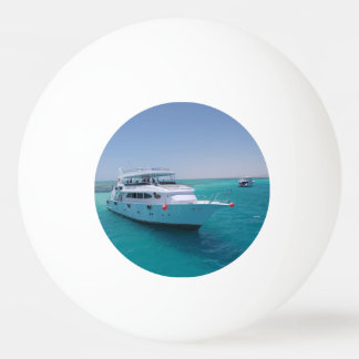 Snow-white yacht  near the White Island in Red Sea Ping Pong Ball