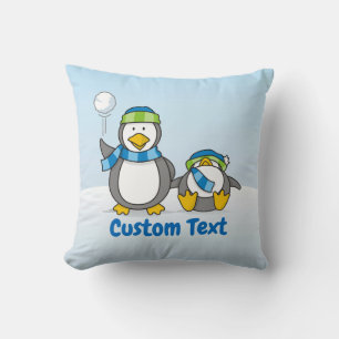 Snowballing penguins cushion
