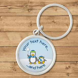 Snowballing penguins key ring