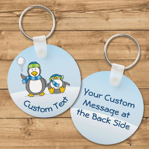 Snowballing Penguins Keychain
