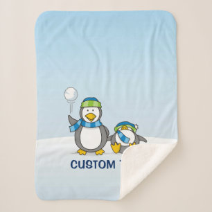 Snowballing penguins sherpa blanket
