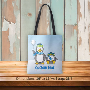Snowballing penguins tote bag