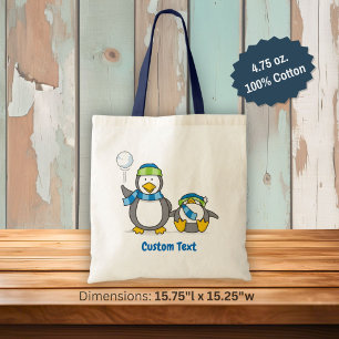 Snowballing penguins tote bag