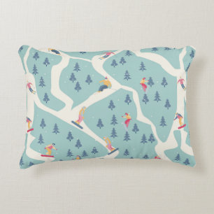 Snowboarders and skiers ride in the ski resort. Pe Decorative Cushion