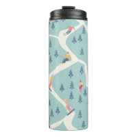 Snowboarders and skiers ride in the ski resort. Pe