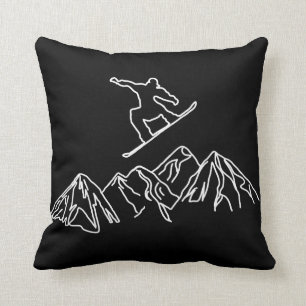 Snowboarders in the mountains cushion