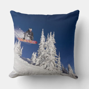 Snowboarding action at Whitefish Mountain Resort Cushion