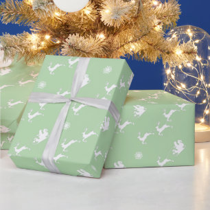 Snowflake and Santa with Sleigh on Light Green Wrapping Paper
