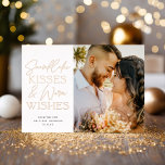 Snowflake Kisses Newlywed Christmas Three 3 Photo<br><div class="desc">This elegant holiday wedding announcement features one vertical photo and a greeting in raised foil on the front. The greeting on the front says "Snowflake Kisses & Warm Wishes". The back of the card has two square photos. You can also add text to the back.</div>
