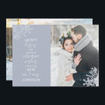 Snowflake Merry Kisses Warm Wishes 2 Photo Holiday Card<br><div class="desc">Celebrate your first holiday season as newlyweds with our elegant Snowflake Merry Kisses Warm Wishes 2 Photo Holiday Card Christmas card. Featuring a stunning wedding photo accented by delicate icy blue snowflakes, this card reads "merry kisses and warm holiday wishes from the new mr and mrs, " and is personalised...</div>