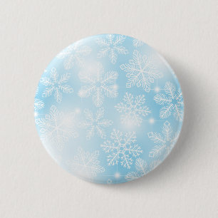 Snowflakes and lights on blue 6 cm round badge