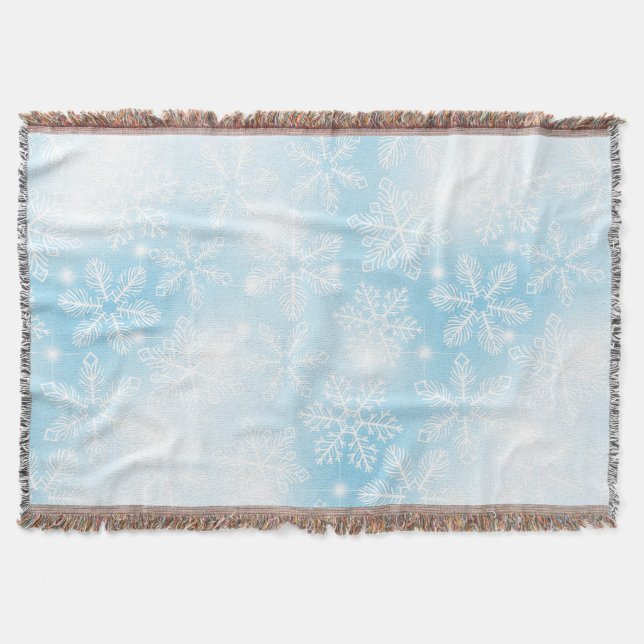 Snowflakes and lights on blue throw blanket (Front)