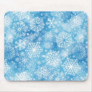 Snowflakes on blue mouse pad