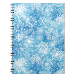 Snowflakes on blue notebook