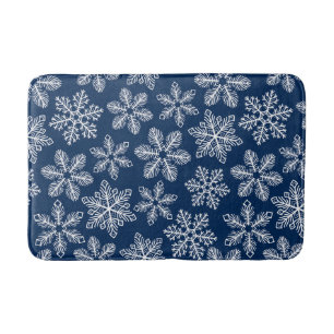 Snowflakes on dark blue bath mat