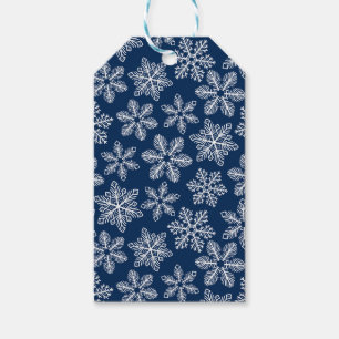Snowflakes on dark blue gift tags
