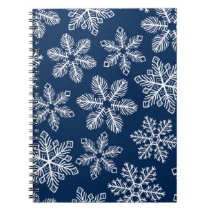 Snowflakes on dark blue notebook