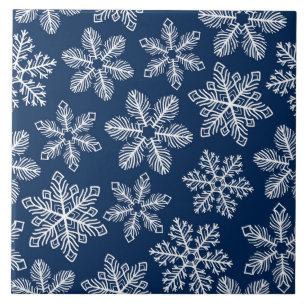 Snowflakes on dark blue tile