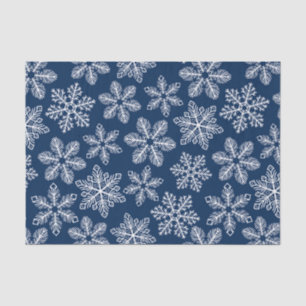 Snowflakes on dark blue tissue paper