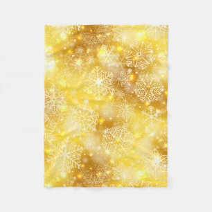 Snowflakes on golden fleece blanket