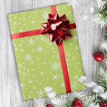 Snowflakes on Green Retro Cute Whimsical Christmas Wrapping Paper<br><div class="desc">This cute Christmas design features soft snowflakes on a green background for a magical and whimsical vibe. The soft retro colour palette is perfect for the Holiday season with a touch of mid century modern nostalgia and charm. This design coordinates perfectly with the rest of my Magical Christmas Elf collection....</div>