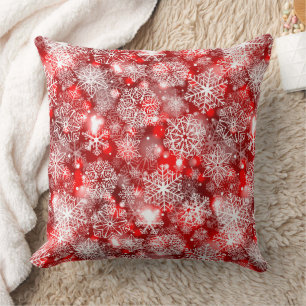 Snowflakes on red cushion