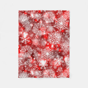 Snowflakes on red fleece blanket