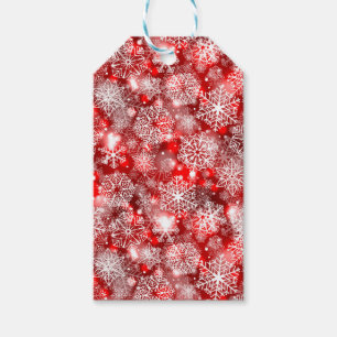 Snowflakes on red gift tags