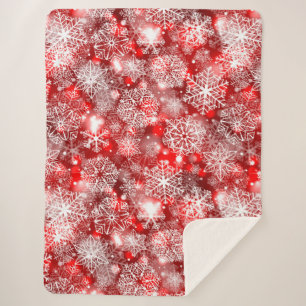 Snowflakes on red sherpa blanket