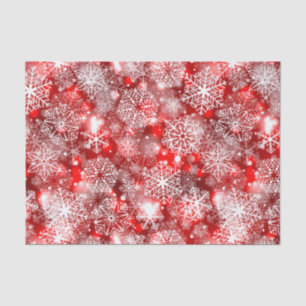 Snowflakes on red tissue paper