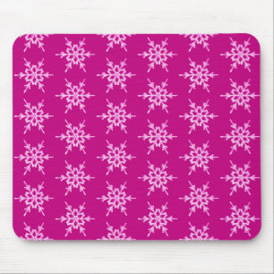 Snowflakes, pale pink crystals on magenta mouse pad