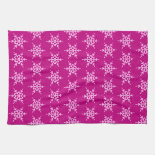 Snowflakes, pale pink crystals on magenta tea towel