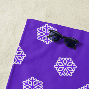 Snowflakes pattern on blue beach towel