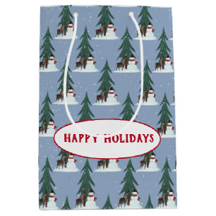 snowman and deer in snowflakes on blue medium gift bag
