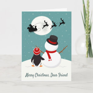 Snowman and Penguin Watch Santa's Sleigh Holiday Card